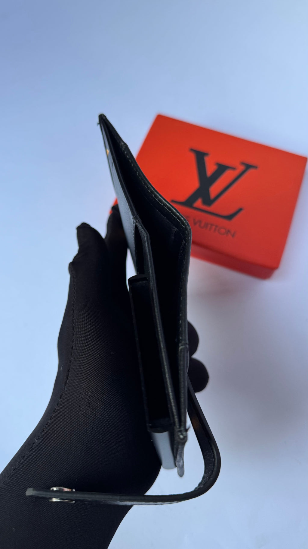 Louis Vuitton Bifold Automatic Wallet- Press