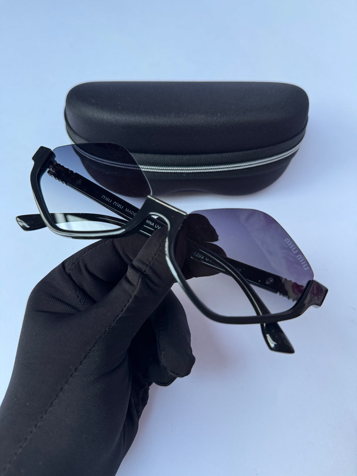 MiuMiu Geometric sunglasses