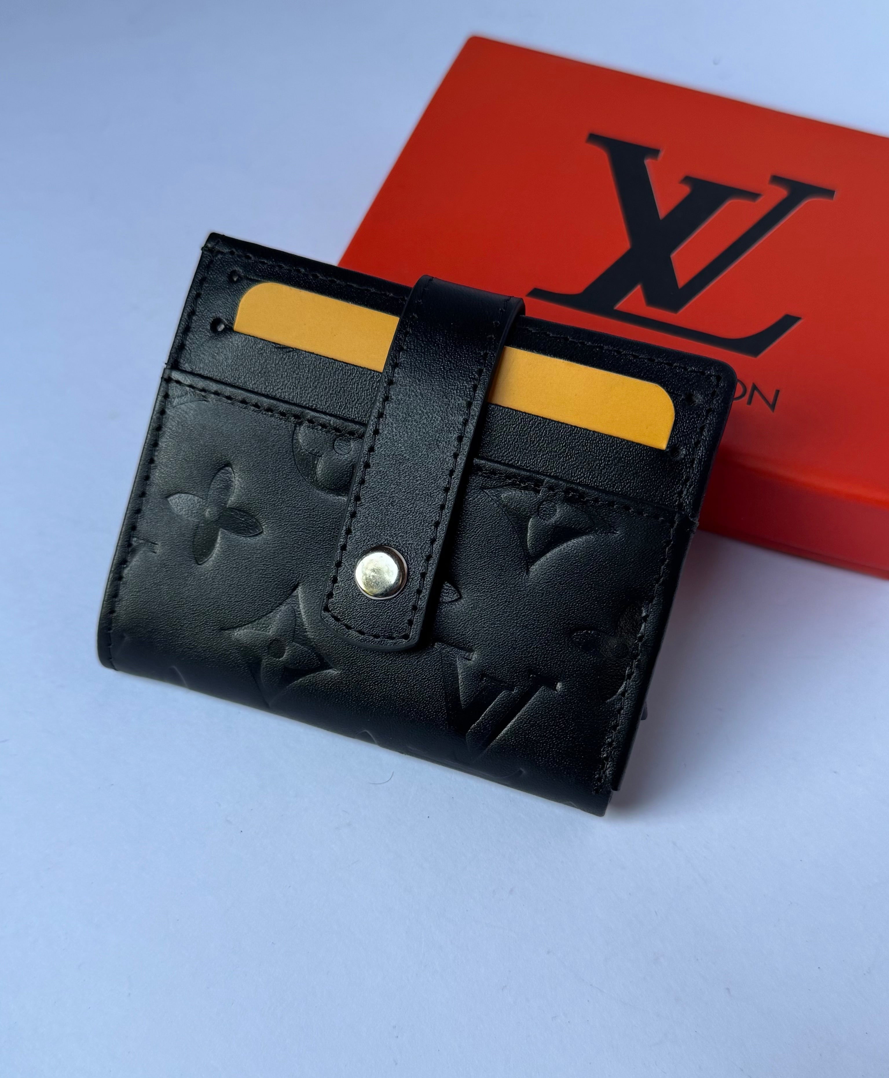 Louis Vuitton Bifold Automatic Wallet- Press